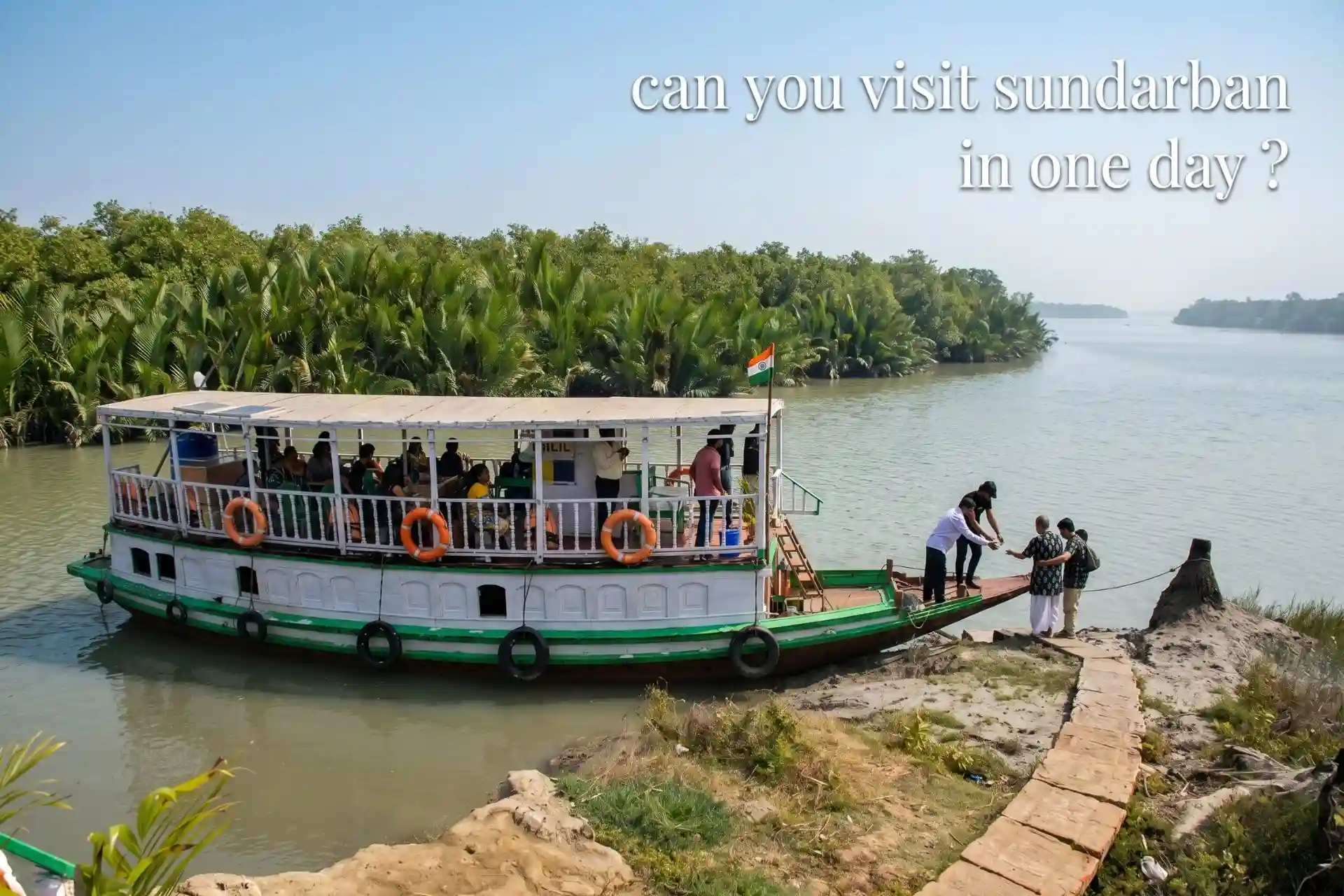 Sundarban jetty ghat with tourist boat near mangrove forest river